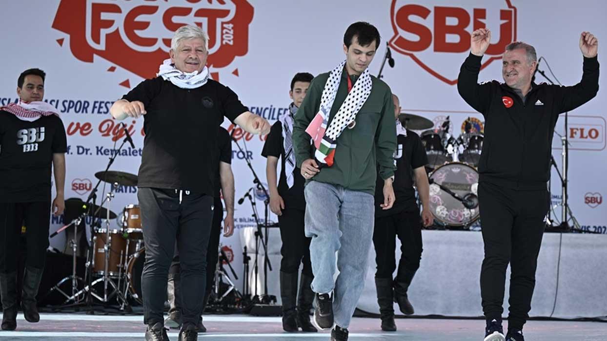 Bakan Bak'tan milli sporcu Necmettin Erbakan Akyüz ve Rektör Aydın ile “dabke” dansı