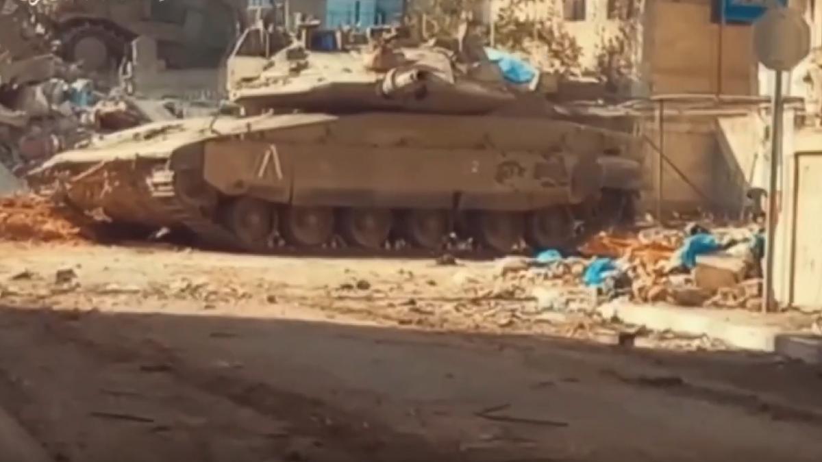 İşgalci askerler kaçacak delik bulamadı... Kassam İsrail tankını havaya uçurdu