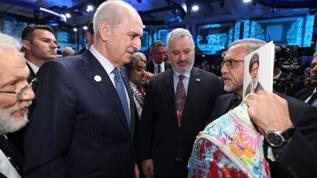 İran heyeti PAB Genel Kurulu'nda kanlı sırt çantasıyla katıldı