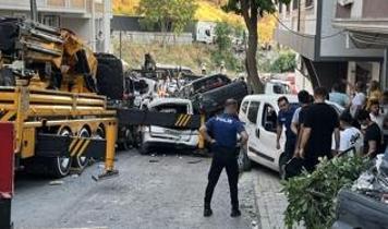 Yokuştan kayan vinç dehşet saçtı: 23 aracın hasar gördüğü o anlar kamerada!